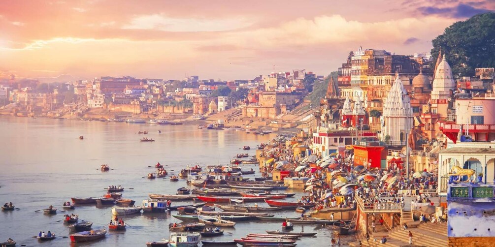 A riverside cityscape with numerous boats and a densely packed waterfront. 1