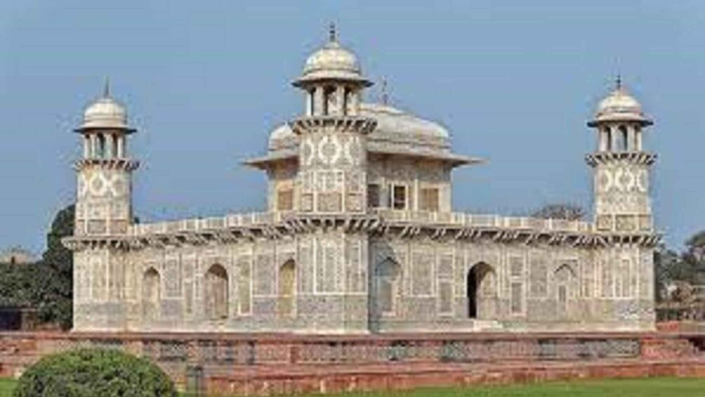A large, ornate building with domes and minarets. 4
