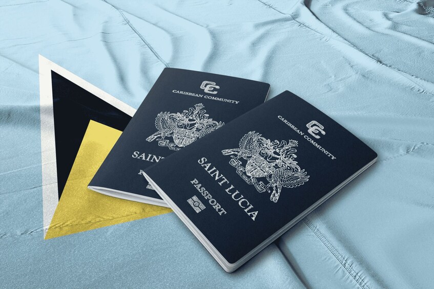 Two passports on a blue fabric background. 1