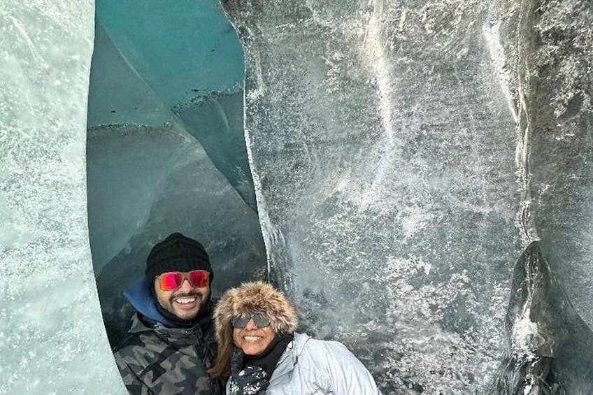 Admiring some of the beautiful blue ice caves! 3