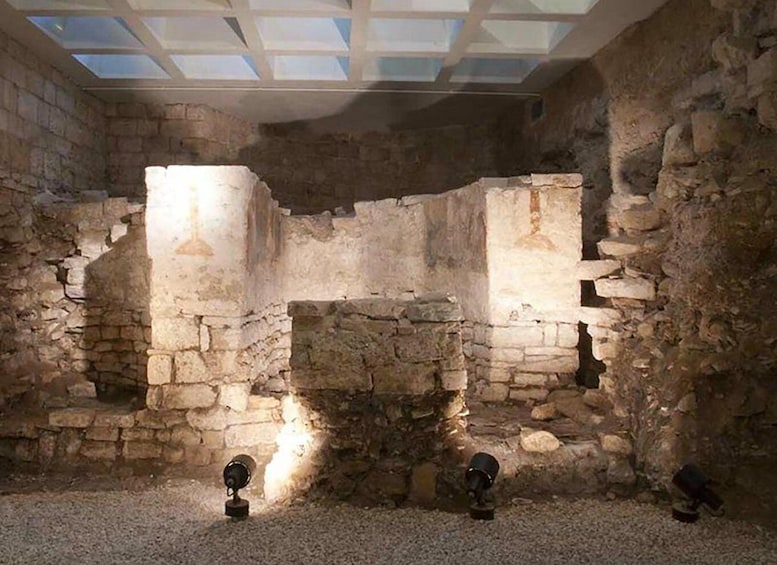 An ancient stone structure with a skylight. 1