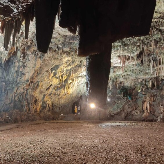 A cave with stalactites and stalagmites. 3