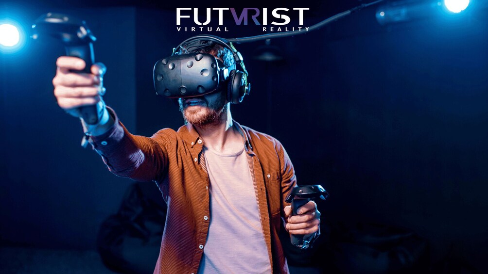 A person wearing a VR headset holding a VR controller. 3
