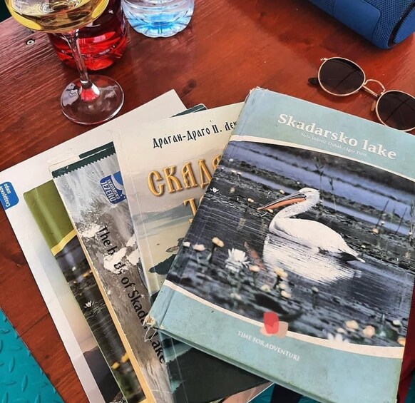 A book titled 'Skadar Lake' and another book with a bird on the cover. 3
