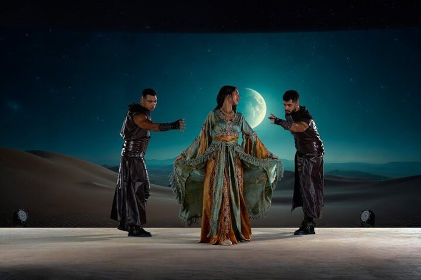 A desert landscape with a large moon in the background. 3