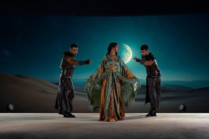 A desert landscape with a large moon in the background. 4