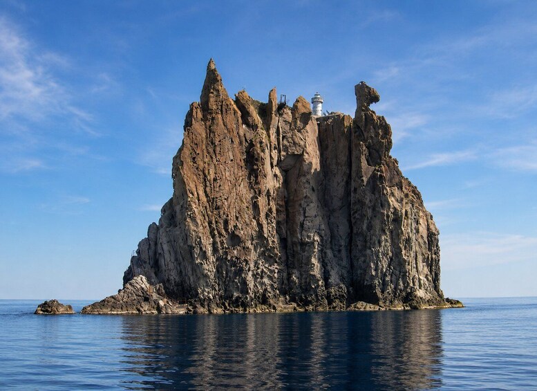 A rocky island with a lighthouse. 3