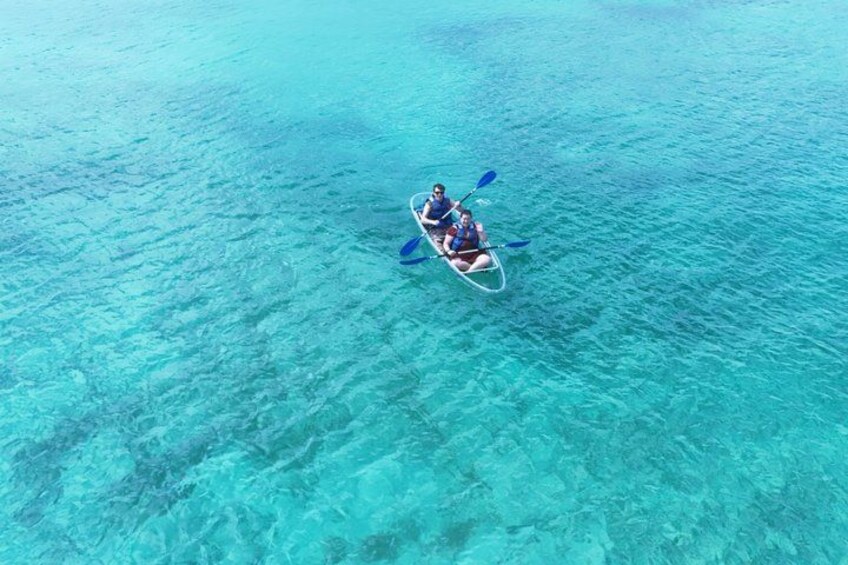 A kayak on clear turquoise water. 4