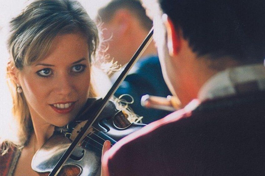 A person playing a violin. 2