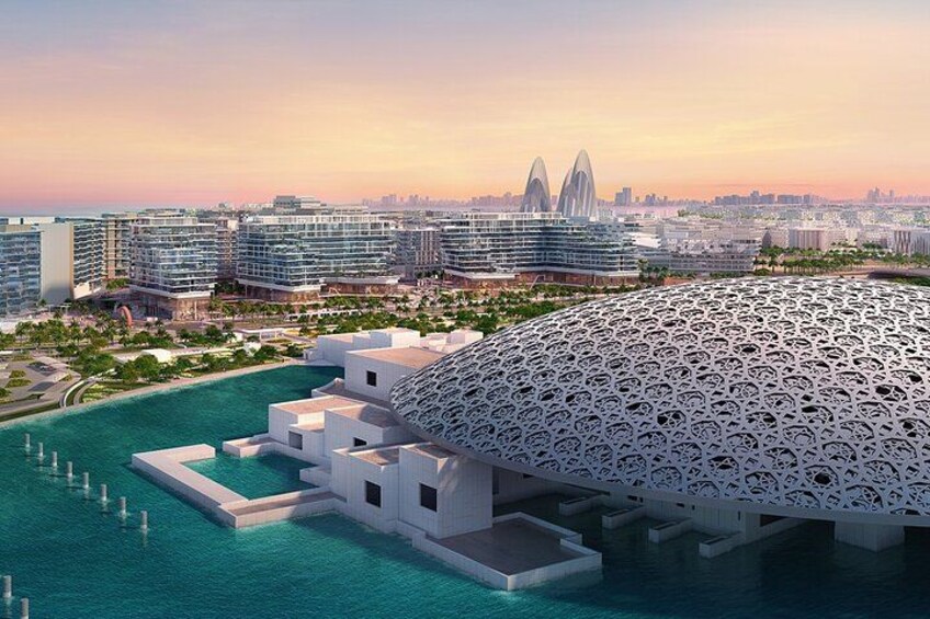 A modern architectural structure with a unique dome design, surrounded by a body of water and a cityscape in the background. 2