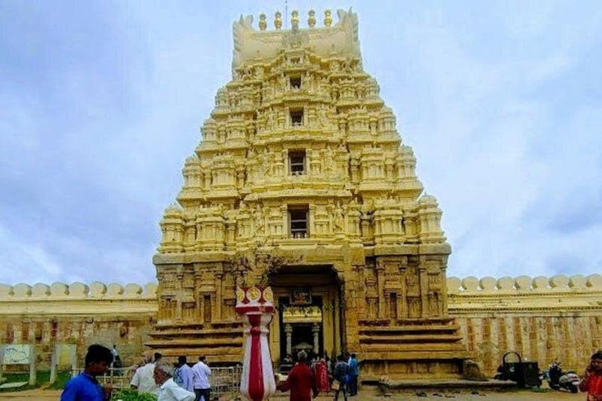 A temple with intricate carvings and a large central tower. 5