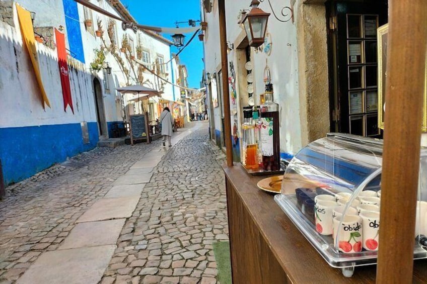 The-Amity-Family-Tours-And-Activities-Óbidos-Portugal-Castle-Walls-Medieval-Town-Ginja-Sun 4
