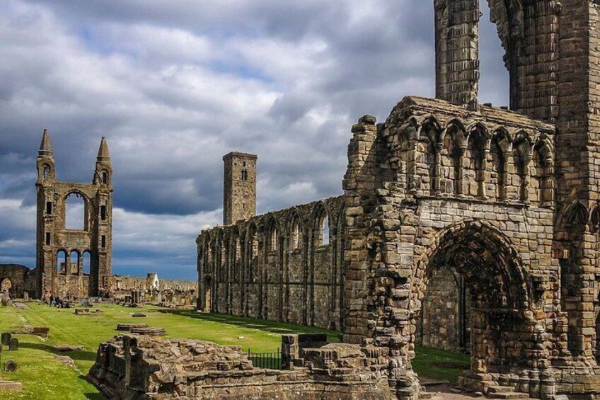 Ancient stone ruins with arches and towers. 2