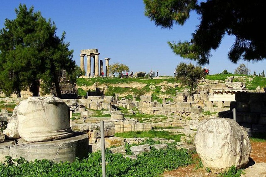Ancient ruins with columns and stone structures. 5