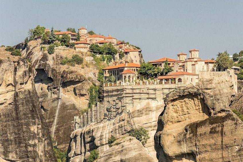 A historic monastery perched on a rocky cliff. 2