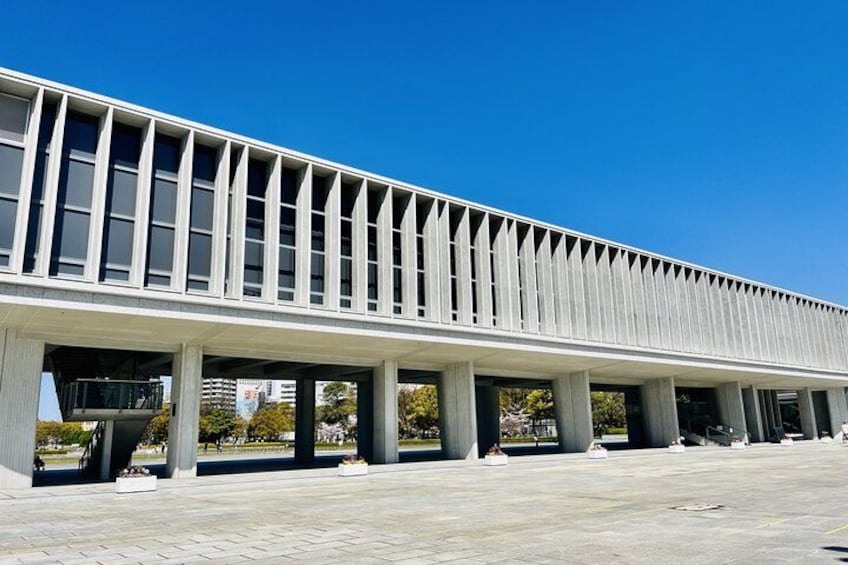A modern building with a flat roof and large windows. 3