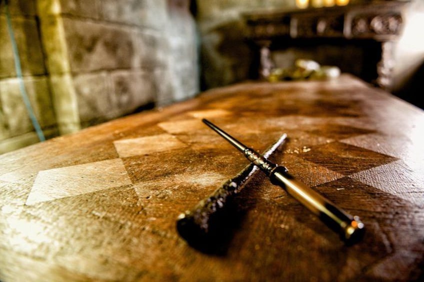 Magic wands on the table in the Merlin's Magic Academy escape room 3