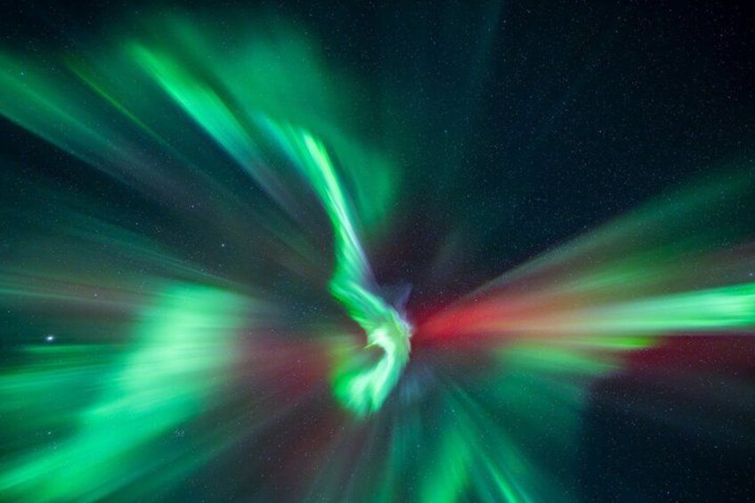 A starry night sky with green aurora borealis. 5