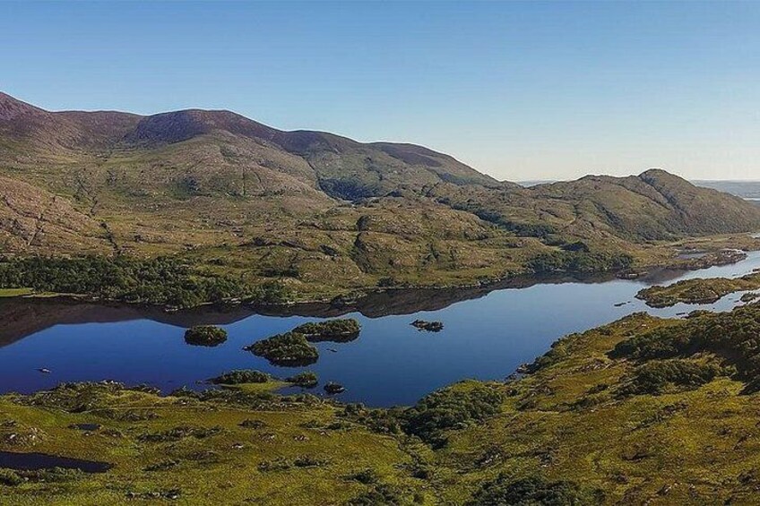 A lake surrounded by hills. 3