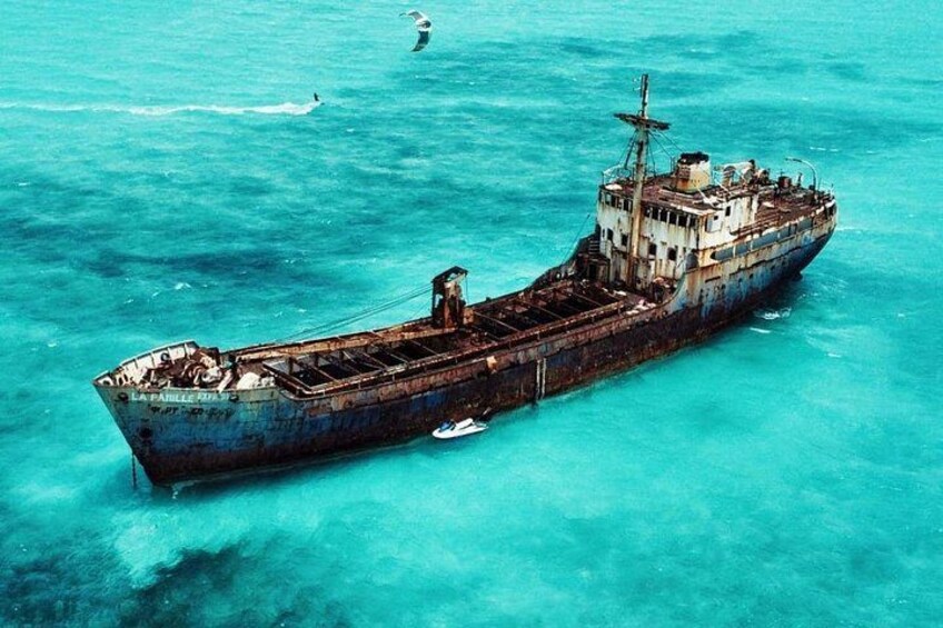 The shipwreck became firmly planted in the shallow waters of the Caicos Banks during Hurricane Frances in 2004. 2