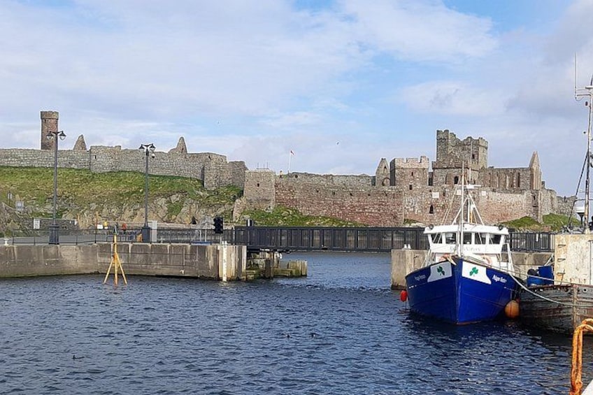Peel Harbour and fishing boats with a backdrop of Peel Castle 3