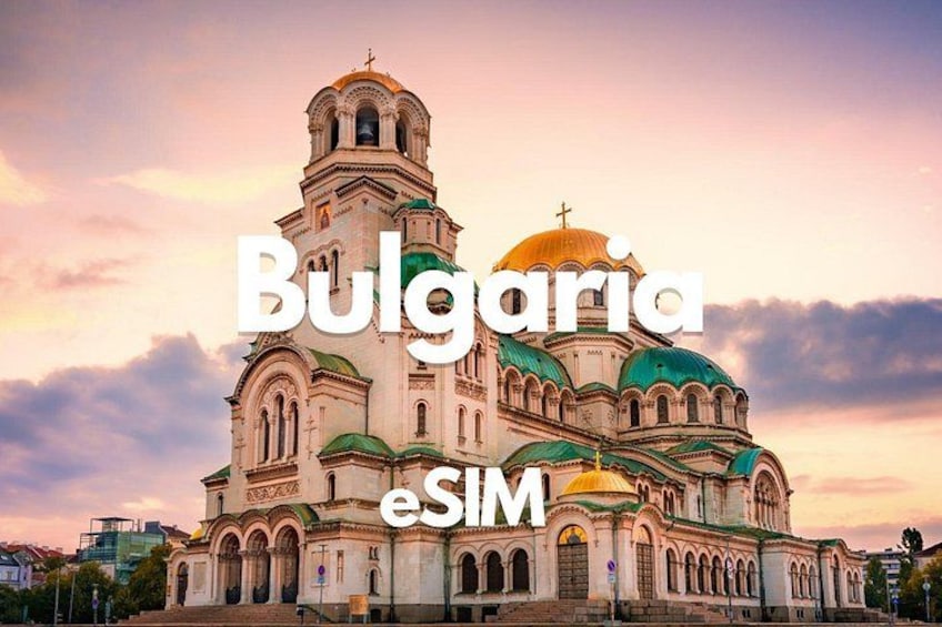 A large, ornate church with multiple domes and a bell tower. 1