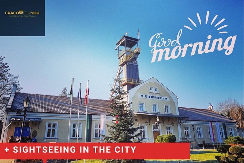 A town hall with a clock tower, flags, and a sign reading 'SIGHTSEEING IN THE CITY'. 2