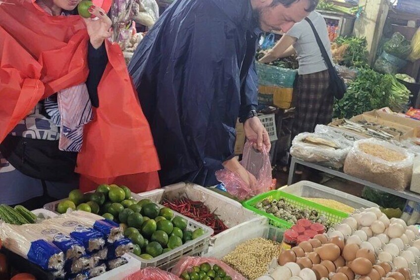 A market with various produce and packaged goods. 2