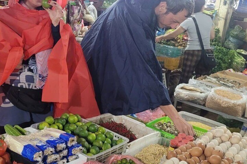 A market with various food items like vegetables, eggs, and packaged goods. 5