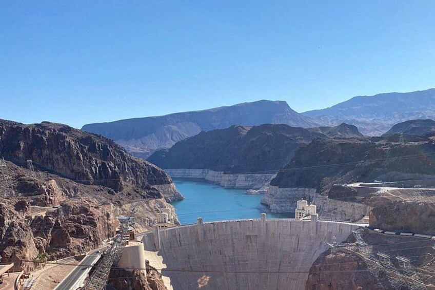 A dam, a reservoir, and mountainous terrain. 2