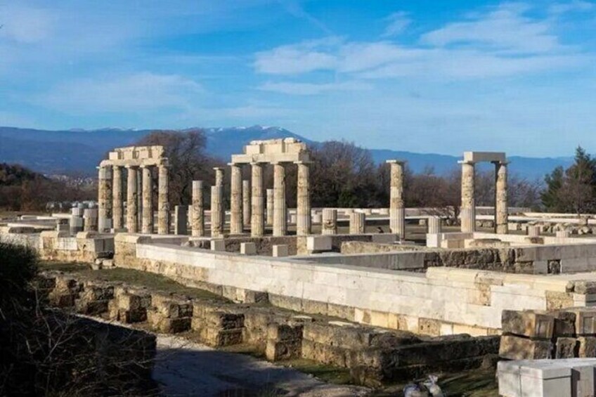Ancient ruins with columns and stone structures. 5
