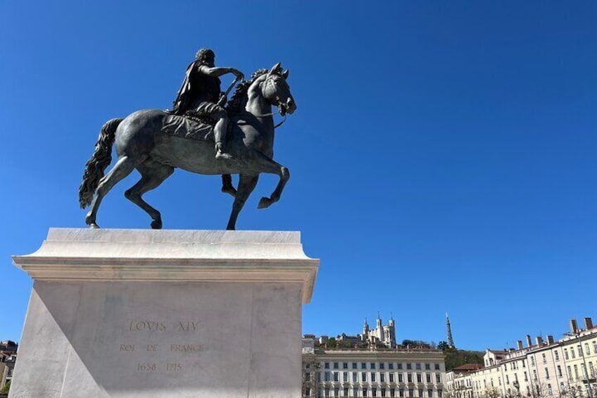 A statue of a man on horseback with a plaque reading 'Louis XV, King of France, 1715-1774.' 5