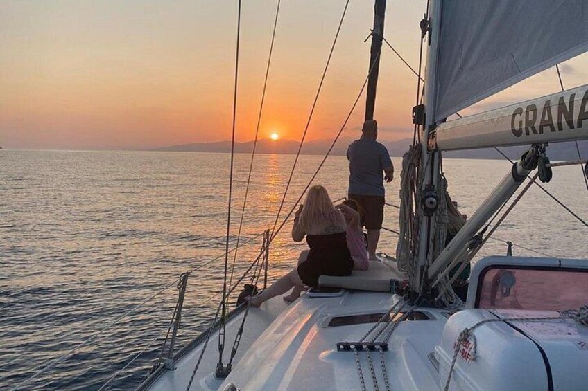 Sailing at sunset along the cliffs of Maro-Compartida 2