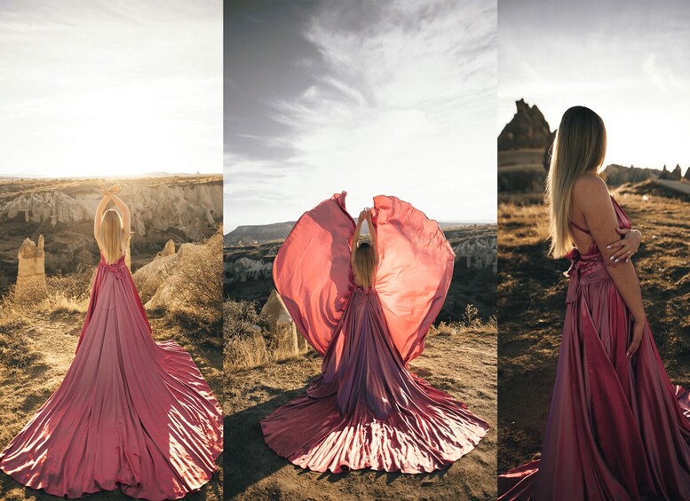 A woman in a flowing red dress standing in a desert landscape with rock formations. 2