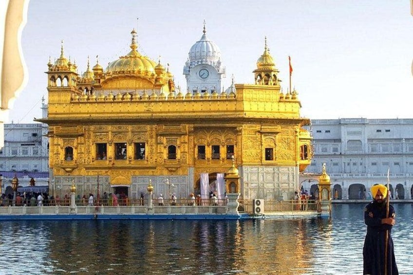 The Golden Temple with a reflection in the water. 5