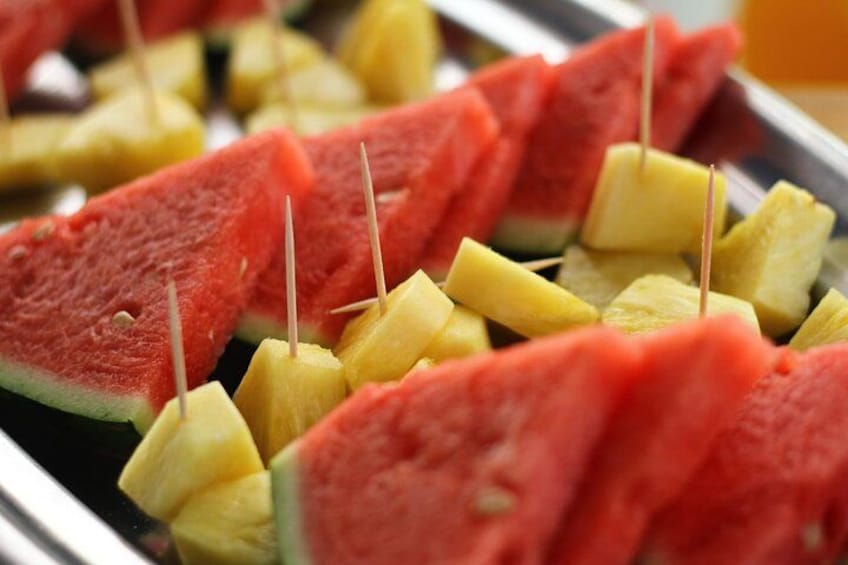 Watermelon and pineapple chunks on skewers. 4
