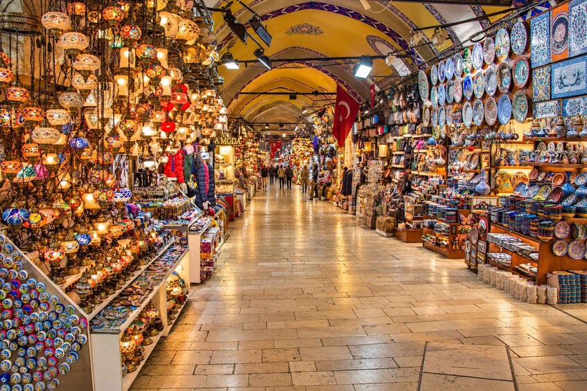 A bustling market with colorful lanterns, traditional textiles, and ceramic goods. 3