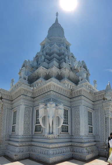 A detailed temple with intricate carvings and a prominent central structure. 4
