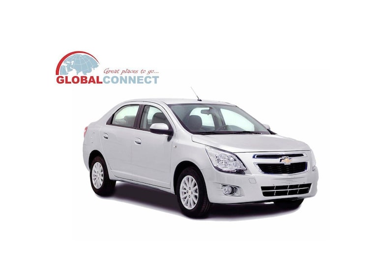 A white Chevrolet car. 5