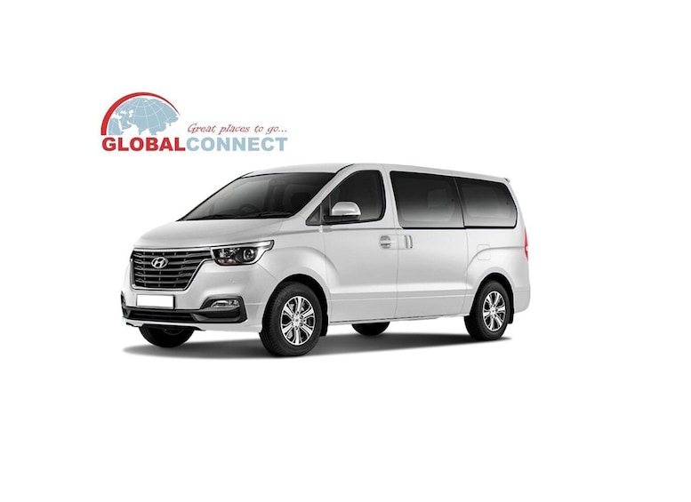 A white van with a logo and text 'GLOBALCONNECT' and 'Great places to go...' 2