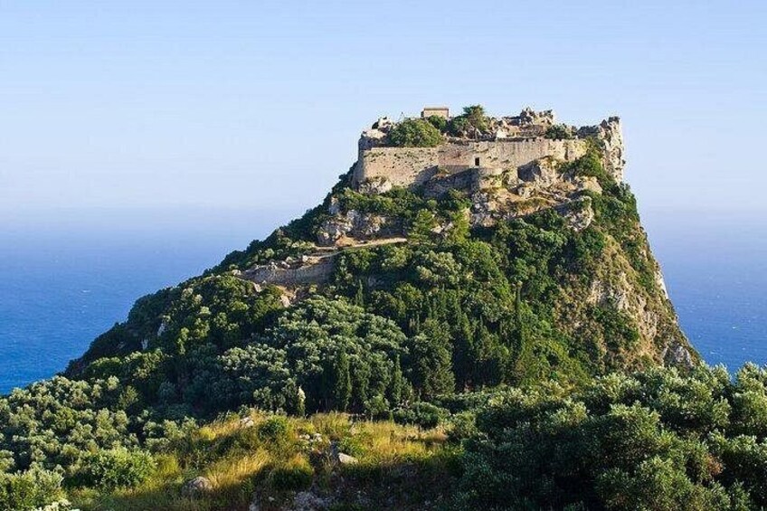 A historic castle on a hill overlooking the sea. 2