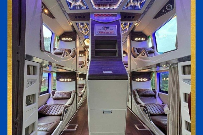 A train interior with multiple compartments, each with individual seating and overhead lighting. 3