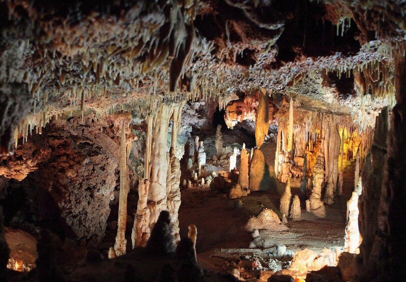 A cave with stalactites and stalagmites. 2