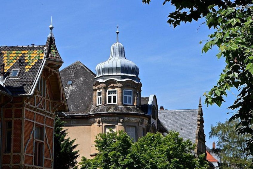 A historic building with a prominent dome and a tower. 2