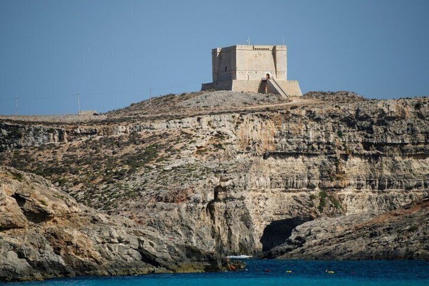 A coastal fortress on a rocky cliff overlooking the sea. 2