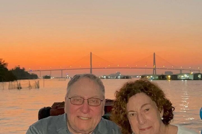A sunset with a bridge in the background. 2