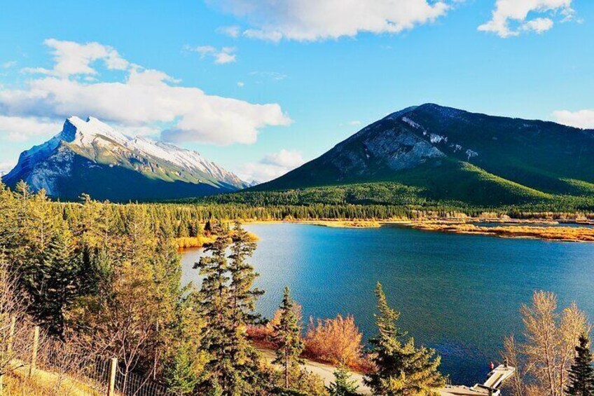 A mountain, a lake, and a forest. 4