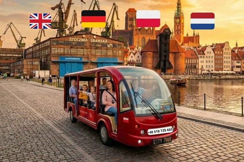 A red city tour bus with passengers, a historic building labeled 'STOCZNA GBASKA', and a river with buildings in the background. 5