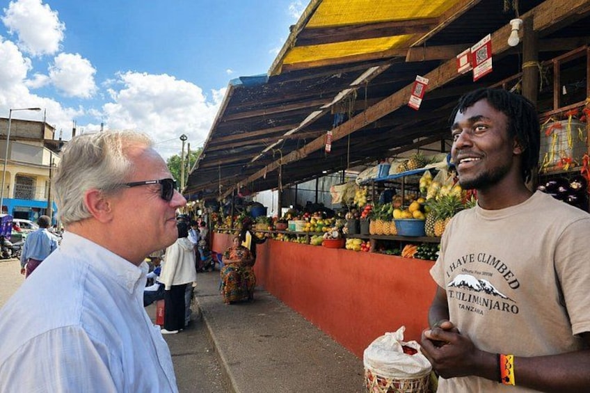 A market scene with a vendor and a customer. 3
