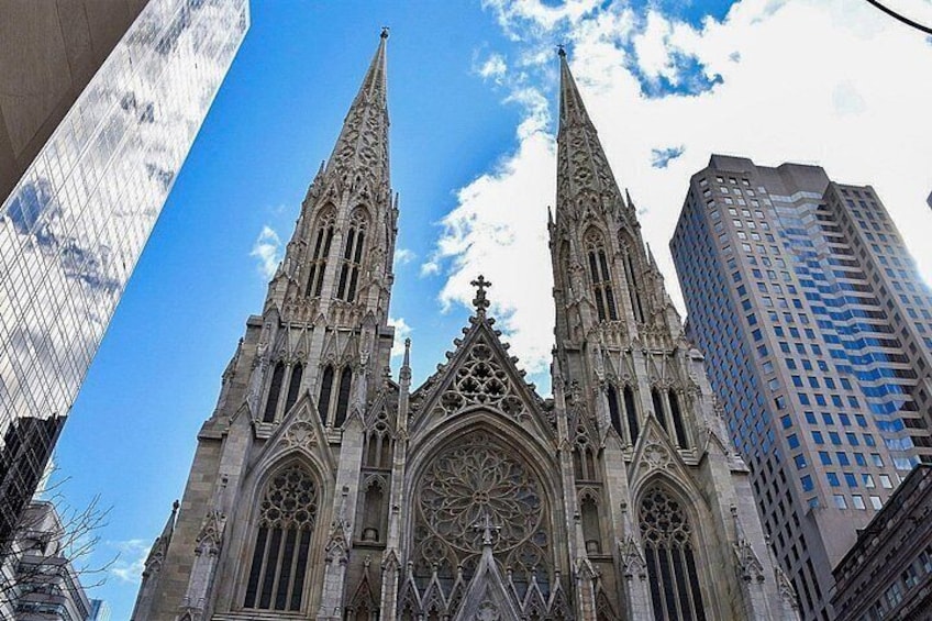 A Gothic cathedral with two spires and a large rose window. 3